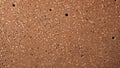 Flat image of cork board surface with pinholes and subtle crushed grain variation Royalty Free Stock Photo