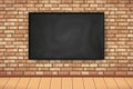 Flat Interior with empty black chalkboard on brown brick wall, wooden floor. Trendy loft room scenery background, gallery Royalty Free Stock Photo