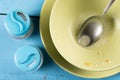 Flat lay above domestic soup bowl with metal spoon on the table with selective focus Royalty Free Stock Photo