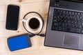 Flat lay above lap top computer keyboard with external usb hard disc hdd and mobile phone and cup of coffee, business concept Royalty Free Stock Photo