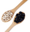 Flat lay of arranged wooden spoons with various healthy seeds in mix Royalty Free Stock Photo