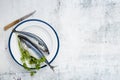 flat lay arrangement with cooked fish stucco background. High quality photo