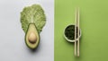 flat lay avocado with bowl greens chopsticks. High quality photo