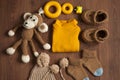 Flat lay.Baby knitted clothes and toys