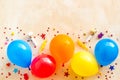 Flat lay with ballons - party concept - on beige background top-down copy space