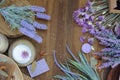 Flat lay bath cosmetics cream and lavender soap, spa template at wooden background with lavender flowers Royalty Free Stock Photo