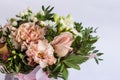 Flat lay of a beautiful florish bouquet composition on the white background