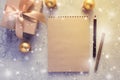 Flat lay of blank brown notebook with gift box in vintage stile