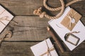 flat lay with blank textbook wrapped letters tree pencil and nautical rope on wooden