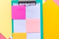 Flat lay of bright colorful sheets of paper notepads Royalty Free Stock Photo
