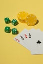Flat lay of casino elements on a yellow background Royalty Free Stock Photo