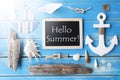 Sunny Nautic Chalkboard And Text Hello Summer Royalty Free Stock Photo