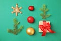 Christmas composition with gift box and festive decor on color background Royalty Free Stock Photo