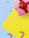 Flat Lay Christmas and Happy New Year or Party Background with Gift boxs, confetti, Present box border on yellow light blue pastel Royalty Free Stock Photo