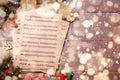 Flat lay with Christmas music sheets on wooden background, space for text Royalty Free Stock Photo