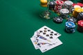 Flat lay Close-up cards for playing poker on a gaming table in a casino against a background of chips. Background for a gaming Royalty Free Stock Photo