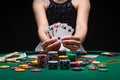 Flat lay Close-up cards for playing poker on a gaming table in a casino against a background of chips. Background for a gaming Royalty Free Stock Photo