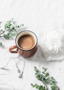 Flat lay cocoa cup and meringue on a white background. Morning breakfast inspiration Royalty Free Stock Photo