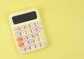 flat lay of colorful calculator on yellow background with copy space Royalty Free Stock Photo