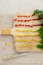 Flat lay of colorful cut stems of Chard vegetables on a wooden chopping board Royalty Free Stock Photo