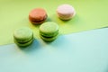 Flat lay of colorful unstable french macaroon cookies like background, dessert concept.Pop Art Color style with meringue