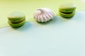 Flat lay of colorful unstable french macaroon cookies like background, dessert concept.Pop Art Color style with meringue