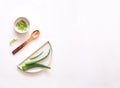Flat lay composition with aloe vera on light background