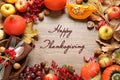 Autumn vegetables, fruits and cutlery on wooden table. Happy Thanksgiving day Royalty Free Stock Photo
