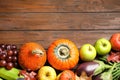 Flat lay composition with autumn vegetables and fruits on wooden background. Happy Thanksgiving day Royalty Free Stock Photo