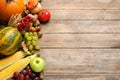 Flat lay composition with autumn vegetables and fruits on wooden background. Happy Thanksgiving day Royalty Free Stock Photo