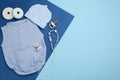 Flat lay composition with baby clothes and accessories on color background Royalty Free Stock Photo