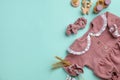 Flat lay composition with baby clothes and accessories on light blue background Royalty Free Stock Photo
