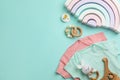 Flat lay composition with baby clothes and accessories on blue background, space for text Royalty Free Stock Photo