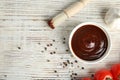 Flat lay composition with barbecue sauce on white wooden table. Royalty Free Stock Photo