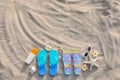 Flat lay composition with beach accessories on sand. Summer vacation Royalty Free Stock Photo