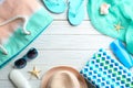 Flat lay composition with beach accessories on wooden background Royalty Free Stock Photo