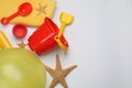 Flat lay composition with beach ball and sand toys on white background Royalty Free Stock Photo