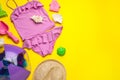 Flat lay composition with beach ball and sand toys on yellow background, space for text Royalty Free Stock Photo