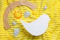 Flat lay composition with bird shaped child`s night lamp on yellow fabric Royalty Free Stock Photo