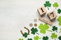 Flat lay composition with block calendar on white wooden table, space for text. Saint Patrick`s Day celebration Royalty Free Stock Photo