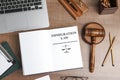 Flat lay composition with book, gavel and laptop Royalty Free Stock Photo