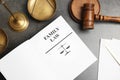 Flat lay composition with book, gavel and scales Royalty Free Stock Photo