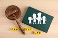 Flat lay composition with book and gavel on background. Family law concept Royalty Free Stock Photo