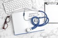 Flat lay composition with book, stethoscope Royalty Free Stock Photo