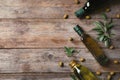 Flat lay composition with bottles of olive oil and space for text Royalty Free Stock Photo