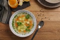 Flat lay composition with bowl of fresh homemade soup to cure flu