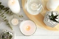 Flat lay composition with burning aromatic candles and plants Royalty Free Stock Photo