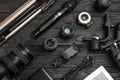 Flat lay composition with camera and video production equipment on black table Royalty Free Stock Photo