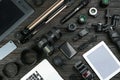Flat lay composition with camera and video production equipment on black table Royalty Free Stock Photo