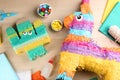 Flat lay composition with cardboard cactus and donkey on wooden table. Pinata diy Royalty Free Stock Photo